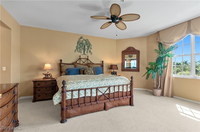 4834 Hampshire Ct Unit 207, Naples, FL 34112 - carpeted bedroom featuring baseboards and a ceiling fan