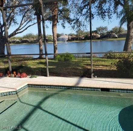 21809 Masters Cir, Estero, FL 33928 - pool with a water view