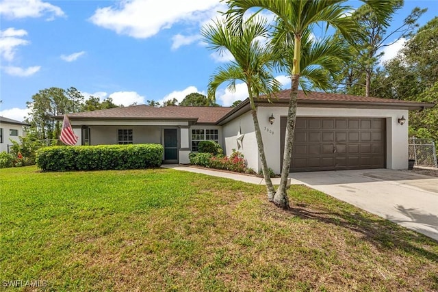 3009 35th St SW, Lehigh Acres, FL 33976 - ranch-style house featuring an attached garage, driveway, a front yard, and stucco siding