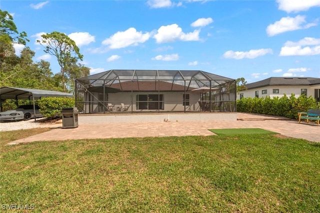 3009 35th St SW, Lehigh Acres, FL 33976 - rear view of house featuring a lawn