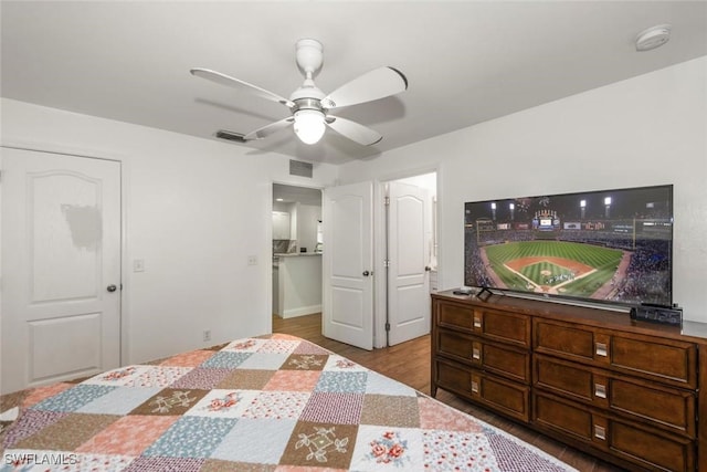 3009 35th St SW, Lehigh Acres, FL 33976 - bedroom with ceiling fan, wood finished floors, and visible vents
