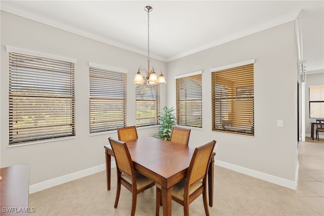 1408 Lucena Ln S, Naples, FL 34113 - dining space with light tile patterned flooring, baseboards, ornamental molding, and an inviting chandelier
