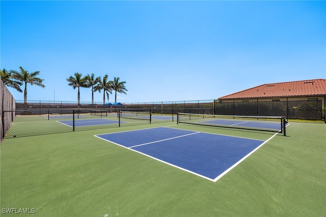 1408 Lucena Ln S, Naples, FL 34113 - view of tennis court with fence