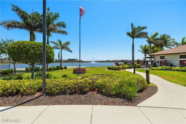 1408 Lucena Ln S, Naples, FL 34113 - view of property's community with a yard and a water view