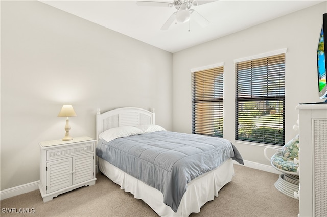 1408 Lucena Ln S, Naples, FL 34113 - bedroom with ceiling fan, light carpet, and baseboards