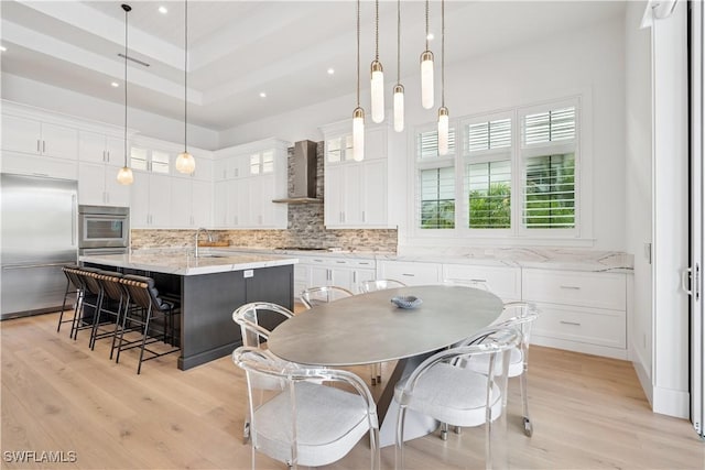 3359 Fanny Bay Ln N, Naples, FL 34114 - dining space featuring light wood-type flooring and recessed lighting