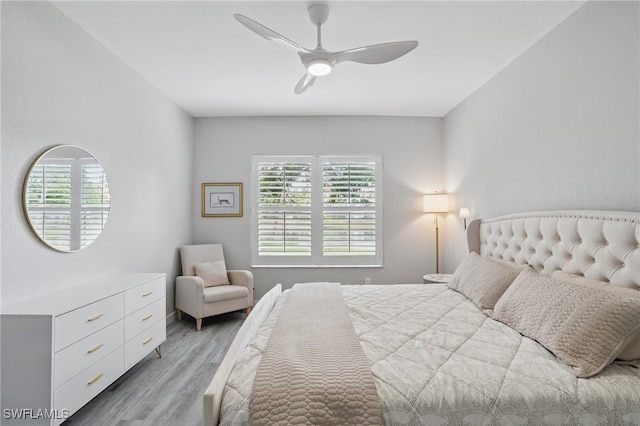 1220 Sarah Jean Cir Unit L103, Naples, FL 34110 - bedroom featuring light wood finished floors and ceiling fan