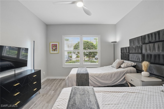 1220 Sarah Jean Cir Unit L103, Naples, FL 34110 - bedroom featuring wood finished floors, baseboards, and ceiling fan