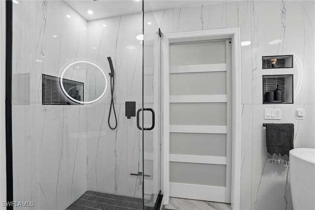 1220 Sarah Jean Cir Unit L103, Naples, FL 34110 - bathroom featuring a marble finish shower