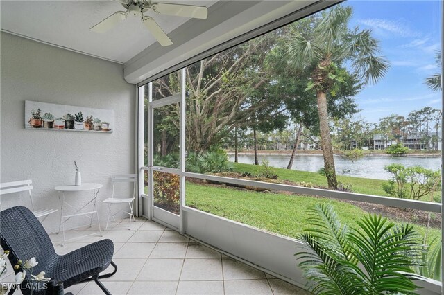 1220 Sarah Jean Cir Unit L103, Naples, FL 34110 - sunroom featuring a water view and a ceiling fan