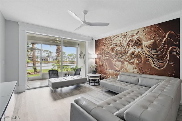 1220 Sarah Jean Cir Unit L103, Naples, FL 34110 - living room with ceiling fan, wood finished floors, and a water view