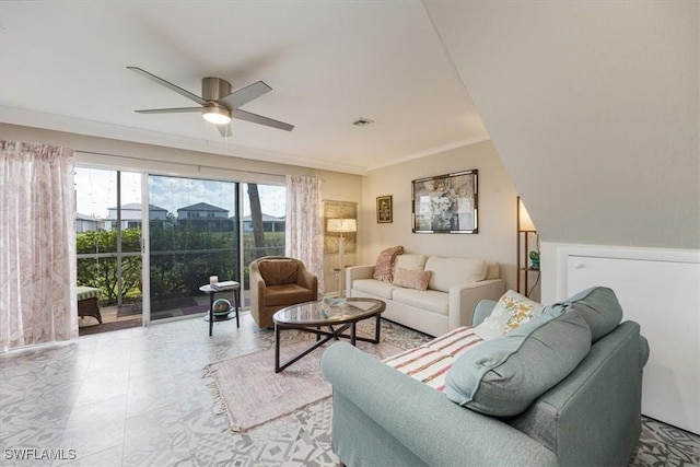 living area featuring visible vents and a ceiling fan