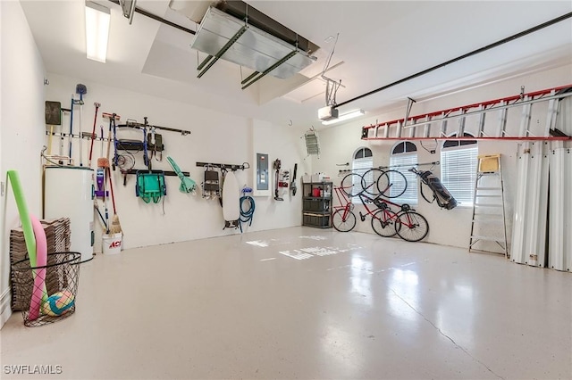 7699 Cottesmore Dr, Naples, FL 34113 - garage featuring water heater, a garage door opener, and electric panel