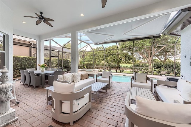 7699 Cottesmore Dr, Naples, FL 34113 - view of patio featuring an outdoor hangout area, outdoor dining space, ceiling fan, and an outdoor pool