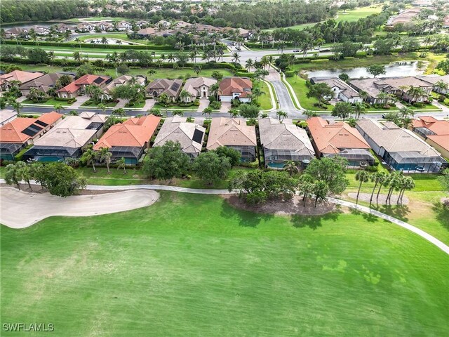 7699 Cottesmore Dr, Naples, FL 34113 - bird's eye view featuring a water view and a residential view