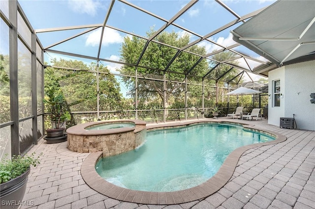 7699 Cottesmore Dr, Naples, FL 34113 - view of pool with a patio, glass enclosure, and a pool with connected hot tub