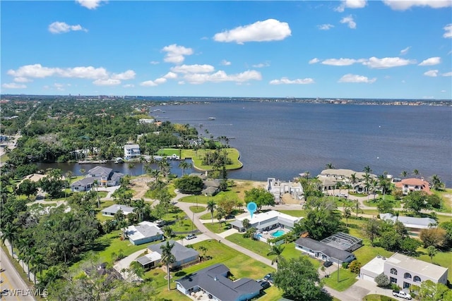 aerial view featuring a water view and a residential view