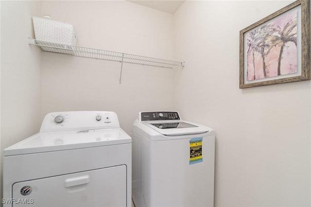 laundry room featuring independent washer and dryer