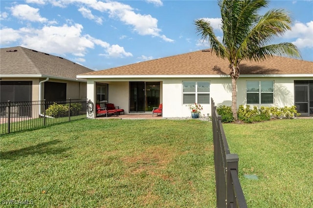 back of property featuring stucco siding and a patio