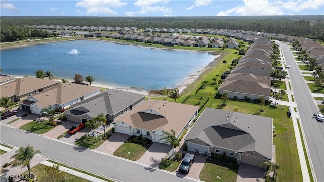 aerial view of residential area with a nearby body of water
