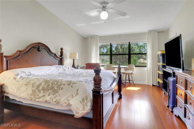 3207 Horse Carriage Way Unit 406, Naples, FL 34105 - bedroom featuring a ceiling fan, baseboards, and wood finished floors