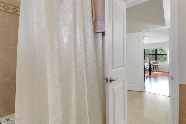 3207 Horse Carriage Way Unit 406, Naples, FL 34105 - bathroom with tile patterned floors and a ceiling fan