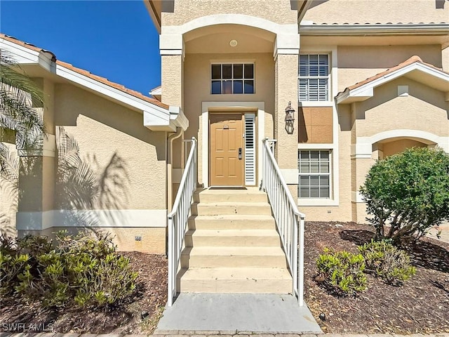 14641 Glen Cove Dr Unit 1704, Fort Myers, FL 33919 - entrance to property with stucco siding