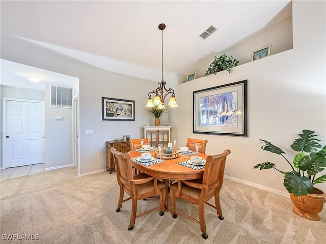 14641 Glen Cove Dr Unit 1704, Fort Myers, FL 33919 - dining area with baseboards, visible vents, and light colored carpet