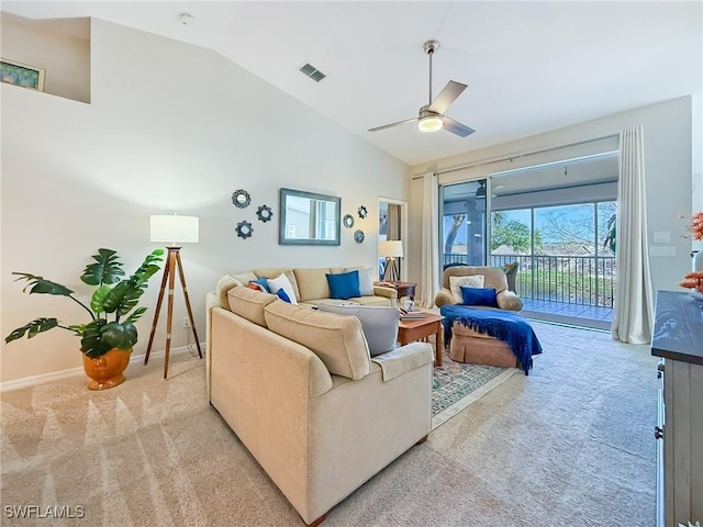 14641 Glen Cove Dr Unit 1704, Fort Myers, FL 33919 - living area with light colored carpet, high vaulted ceiling, baseboards, visible vents, and a ceiling fan