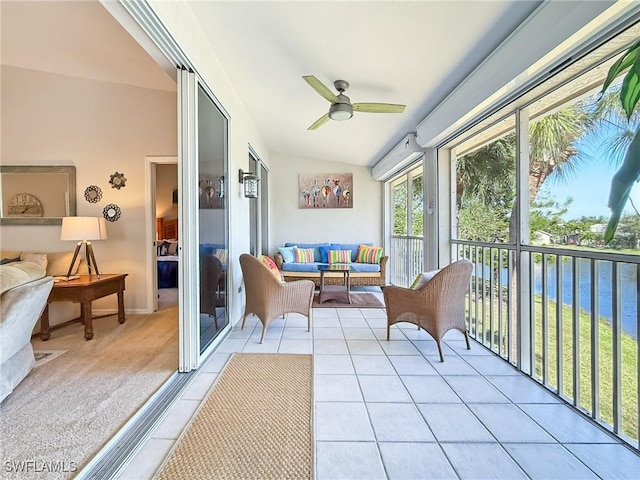 14641 Glen Cove Dr Unit 1704, Fort Myers, FL 33919 - sunroom / solarium with tile patterned floors, a water view, carpet, and lofted ceiling