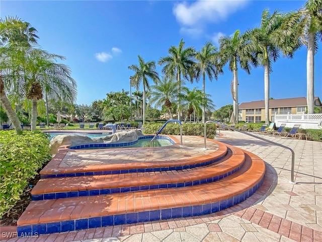 14641 Glen Cove Dr Unit 1704, Fort Myers, FL 33919 - surrounding community featuring fence and a swimming pool