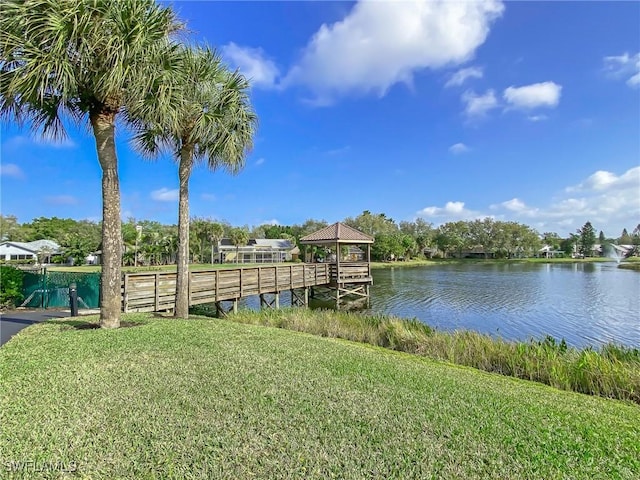 14641 Glen Cove Dr Unit 1704, Fort Myers, FL 33919 - view of dock featuring a water view and a yard