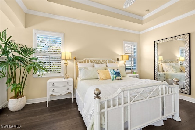 bedroom featuring crown molding, dark wood-style flooring, and multiple windows