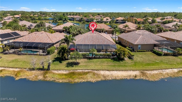 aerial view featuring a residential view and a water view