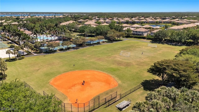 bird's eye view featuring a water view and a residential view