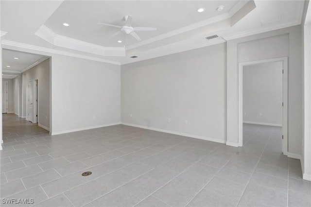 2967 Amblewind Dr, Fort Myers, FL 33905 - spare room with a tray ceiling, ceiling fan, ornamental molding, recessed lighting, and light tile patterned floors