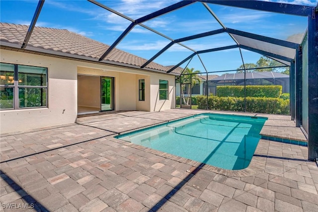 2967 Amblewind Dr, Fort Myers, FL 33905 - outdoor pool featuring a patio area and a lanai
