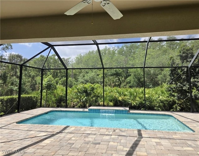 2967 Amblewind Dr, Fort Myers, FL 33905 - swimming pool featuring a ceiling fan, a lanai, and a patio area