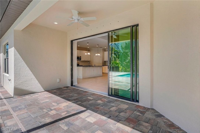 2967 Amblewind Dr, Fort Myers, FL 33905 - view of patio / terrace featuring a ceiling fan