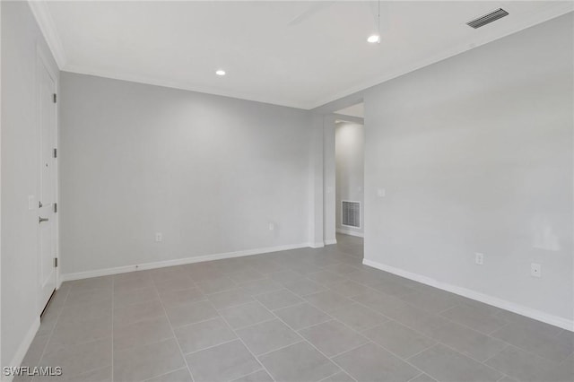 spare room featuring baseboards, visible vents, and recessed lighting