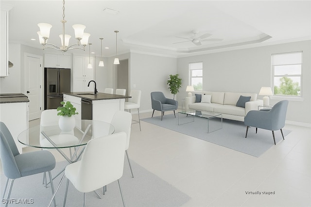 2967 Amblewind Dr, Fort Myers, FL 33905 - dining room with baseboards, a ceiling fan, a chandelier, recessed lighting, and a raised ceiling
