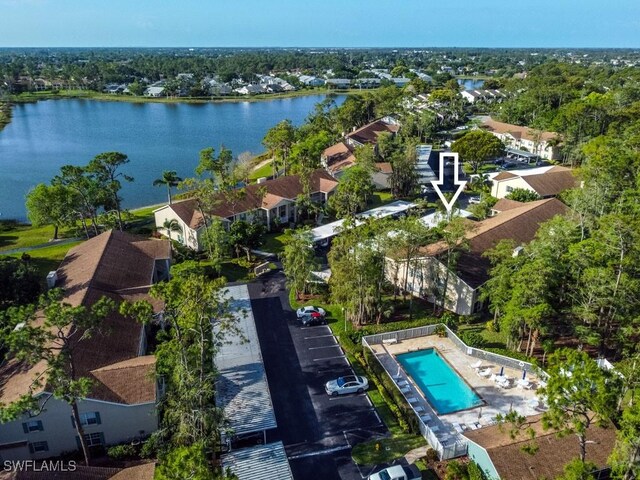1702 Kings Lake Blvd Unit 103, Naples, FL 34112 - aerial view of residential area featuring a pool and a large body of water
