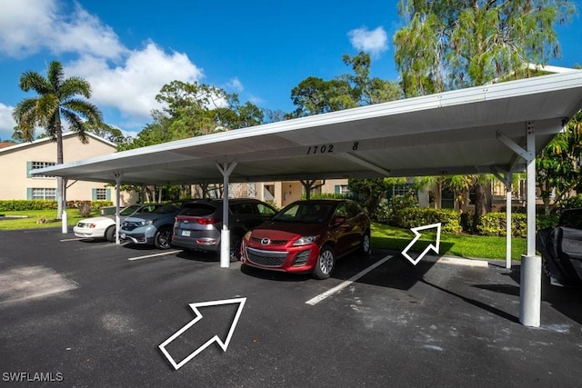 1702 Kings Lake Blvd Unit 103, Naples, FL 34112 - view of covered parking lot