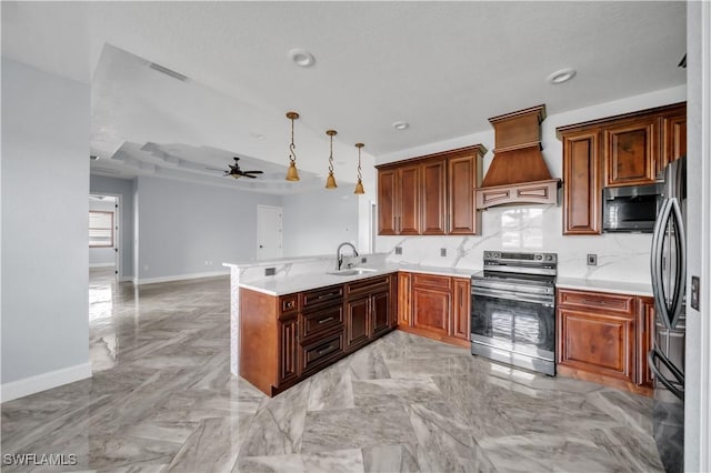 kitchen featuring custom range hood, a sink, appliances with stainless steel finishes, ceiling fan, and baseboards
