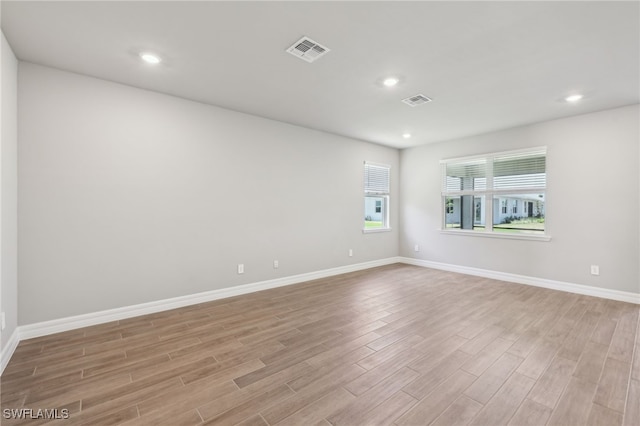 44385 Frontier Dr, Punta Gorda, FL 33982 - empty room featuring light wood-type flooring, baseboards, and recessed lighting