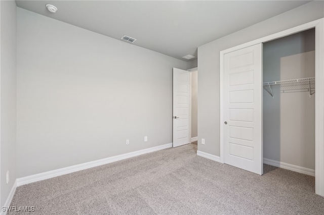 44385 Frontier Dr, Punta Gorda, FL 33982 - unfurnished bedroom with carpet floors, a closet, and baseboards