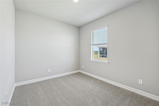 44385 Frontier Dr, Punta Gorda, FL 33982 - carpeted empty room featuring baseboards