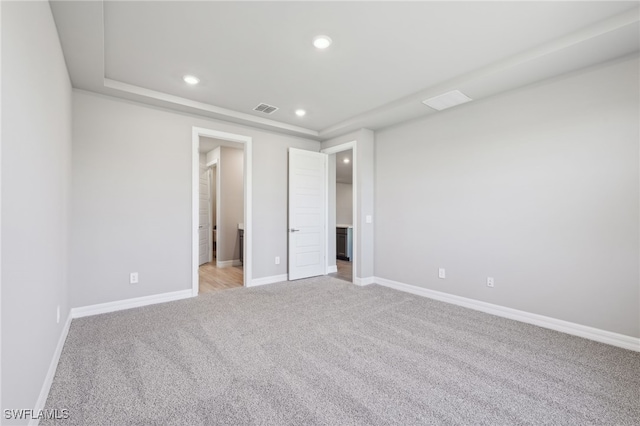 44385 Frontier Dr, Punta Gorda, FL 33982 - unfurnished bedroom with light carpet, recessed lighting, and baseboards
