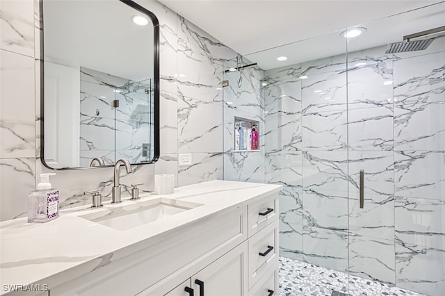 12130 Kelly Greens Blvd Unit 94, Fort Myers, FL 33908 - full bathroom featuring a marble finish shower, vanity, and recessed lighting