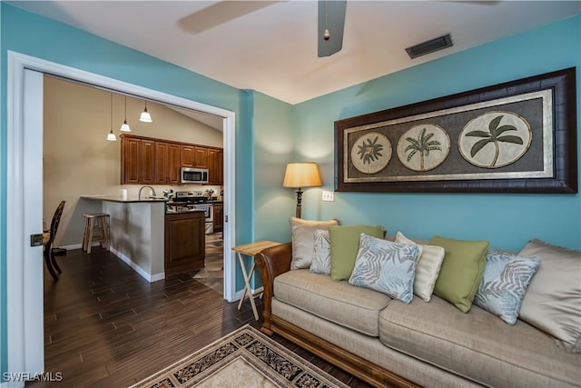 12090 Kelly Greens Blvd Unit 119, Fort Myers, FL 33908 - living room with baseboards, dark wood finished floors, and visible vents